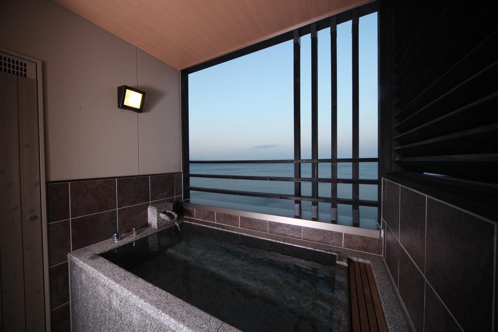 Amane Resort Seikai Бепу Стая снимка A private onsen bath